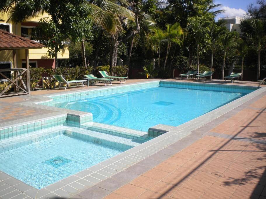 Bazén v ubytování Mix appartment in Boca Chica nebo v jeho okolí