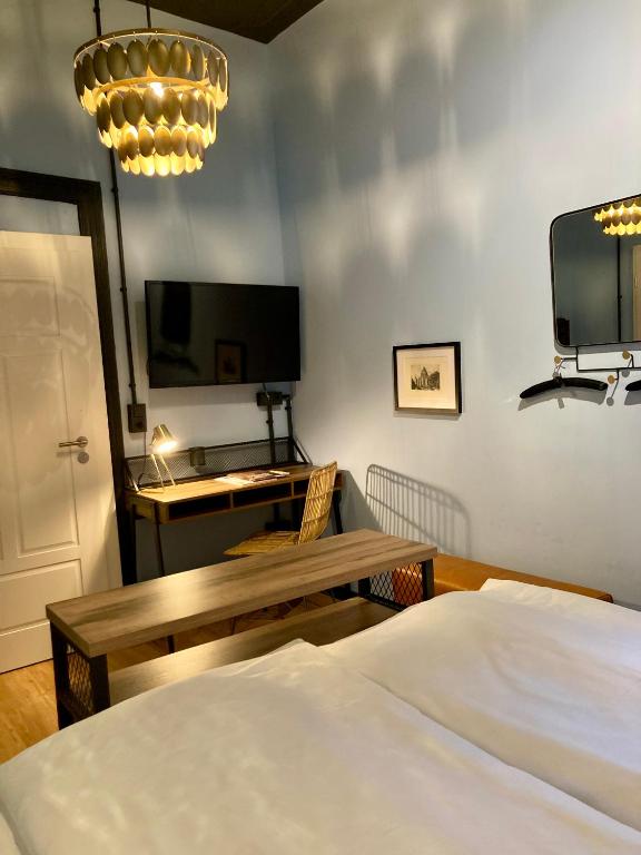 Postel nebo postele na pokoji v ubytování Agli Hotel