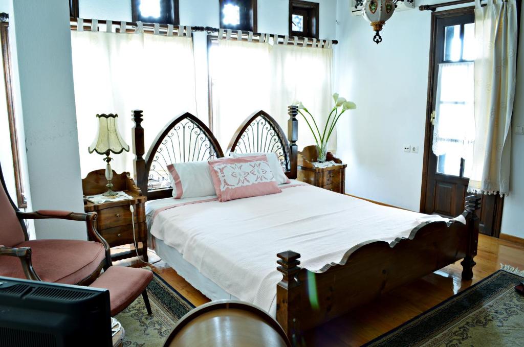 Postel nebo postele na pokoji v ubytování Archontariki Guesthouse