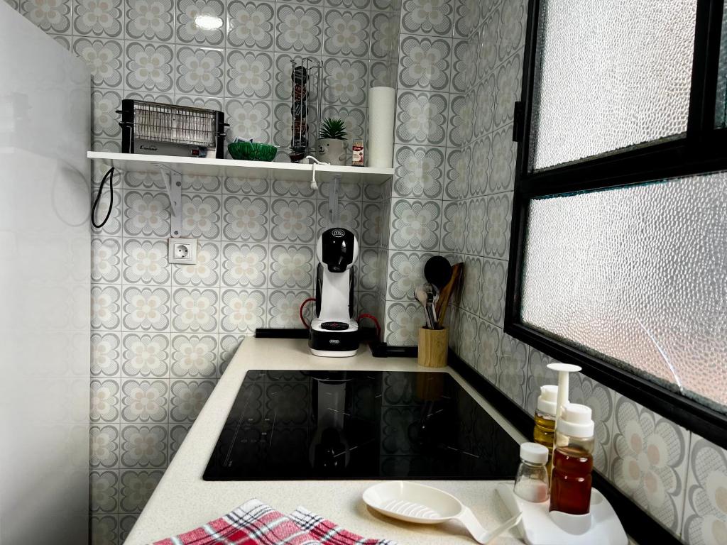 Kuchyňa alebo kuchynka v ubytovaní Amplio apartamento familiar con parking privado en pleno centro de Córdoba