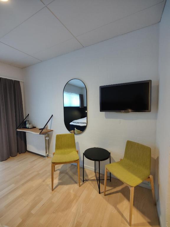 TV a/nebo společenská místnost v ubytování Storebælt Sinatur Hotel & Konference