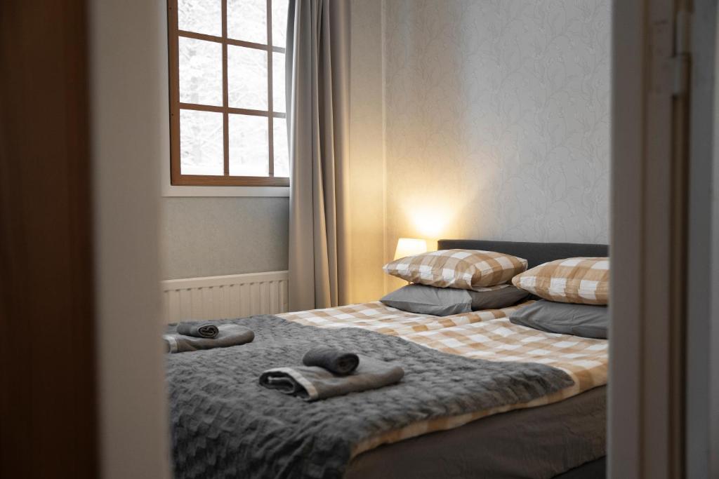 Postel nebo postele na pokoji v ubytování Bed & Breakfast Willa Armas