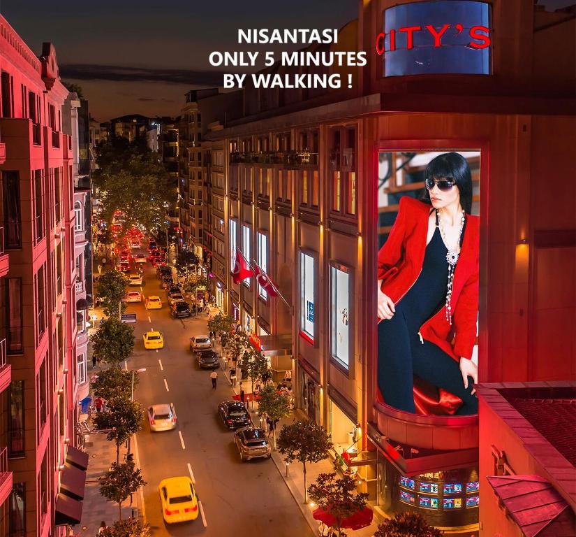 a poster of a woman on the side of a building at TRYP By Wyndham Istanbul Sisli Hotel in Istanbul