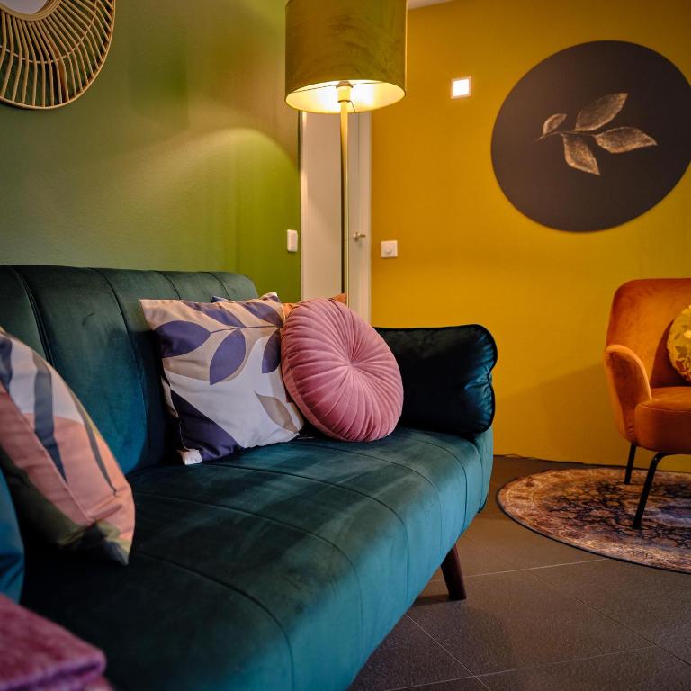 Posezení v ubytování Bungalow AMNIS by Sonnevijver Residences