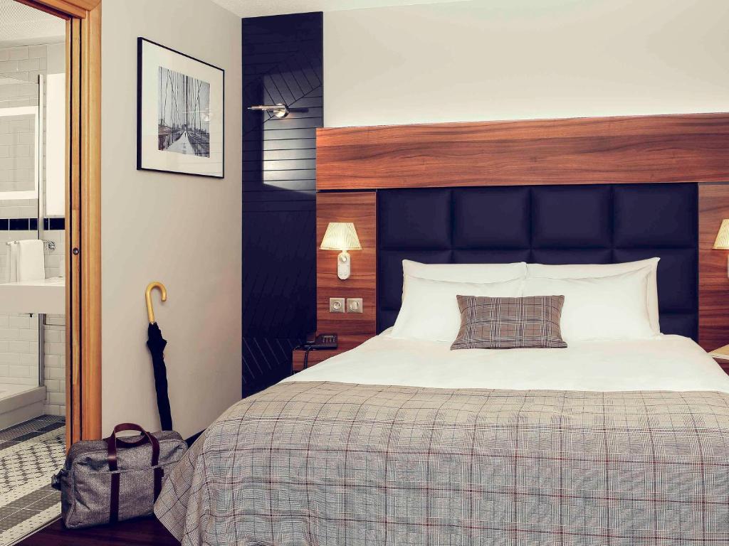 Postel nebo postele na pokoji v ubytování Mercure Hotel Forbach Centre de Loisirs