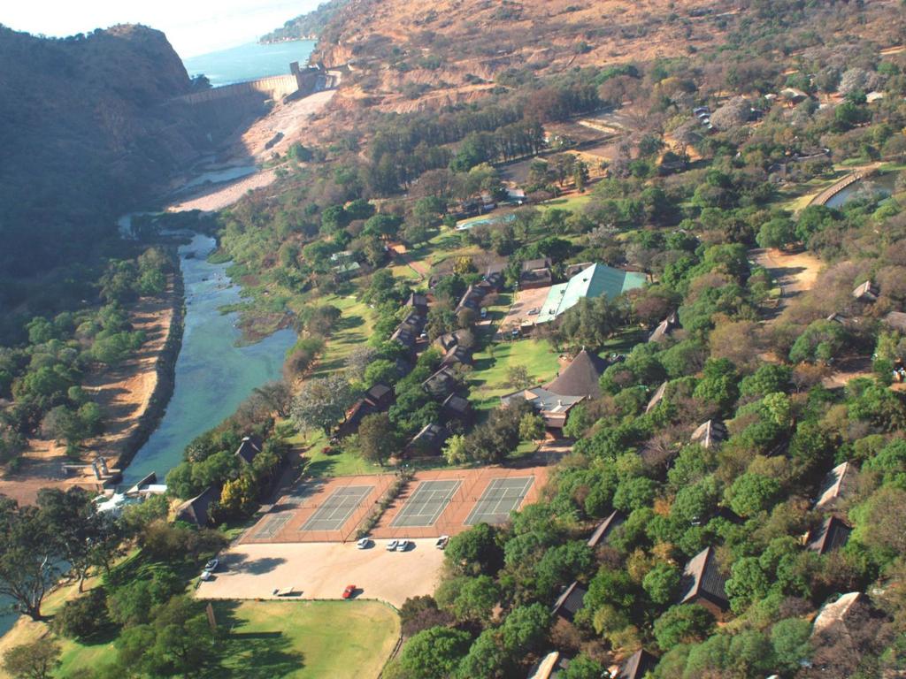 an aerial view of a river and a valley at Mount Amanzi in Hartbeespoort