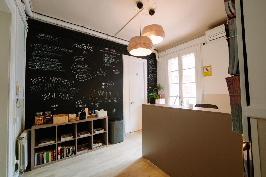a chalkboard wall in a kitchen with a counter at Hostalet de Barcelona in Barcelona