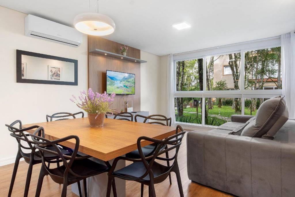 Posezení v ubytování Toscano Cabernet 2 dorm by Achei Gramado