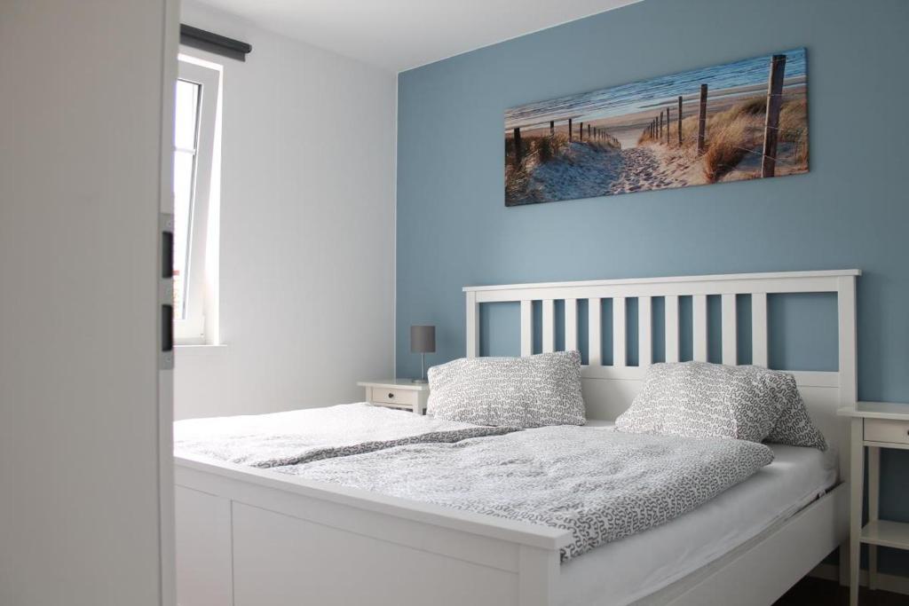 Postel nebo postele na pokoji v ubytování Ferienwohnung Ocean in Born