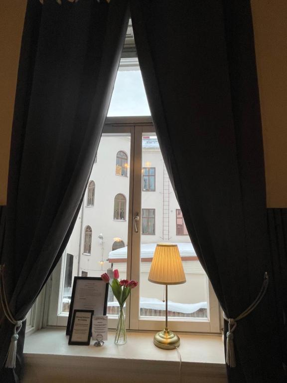 Posezení v ubytování Lilla Hotellet