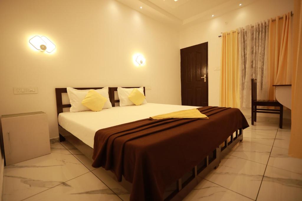 Postel nebo postele na pokoji v ubytování Marari Lotus Beach Villa