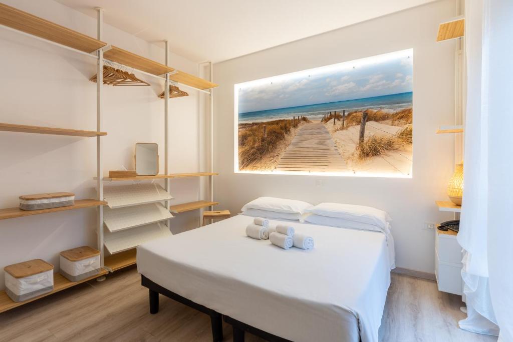 Postel nebo postele na pokoji v ubytování Hotel Germania