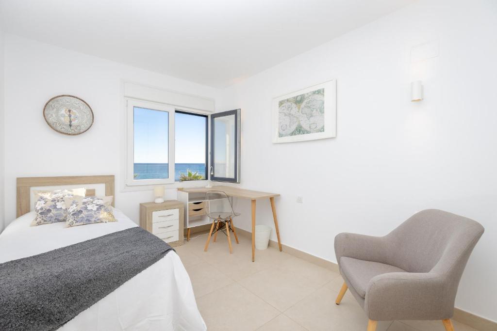 A bed or beds in a room at Fidalsa Paradise Sea Punta Prima