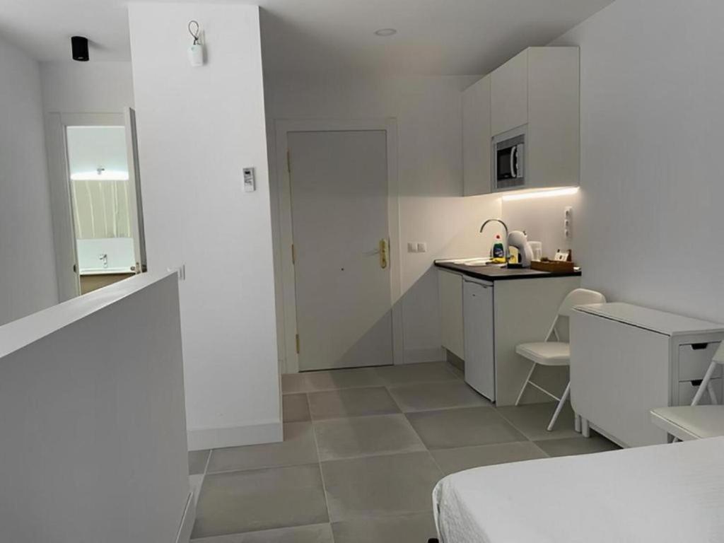 Virtuvė arba virtuvėlė apgyvendinimo įstaigoje C5 Apartamento lujo, zona exclusiva de Chamartín