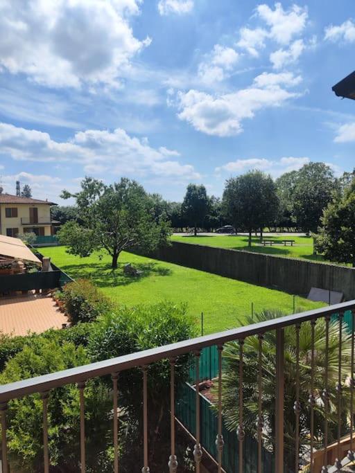 a view of a park from a balcony at Rovato entire apartment in the capital of Franciacorta in Rovato