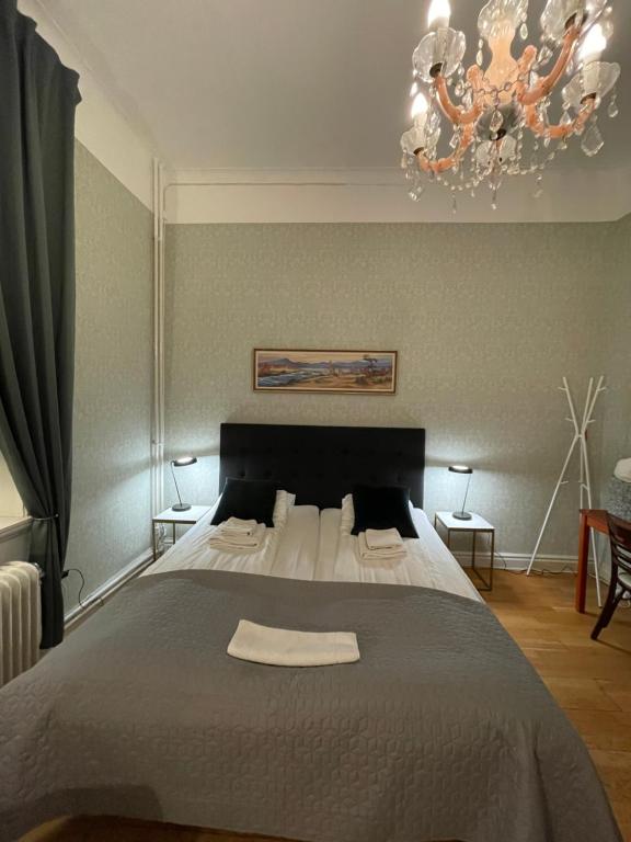 Postel nebo postele na pokoji v ubytování Lilla Hotellet