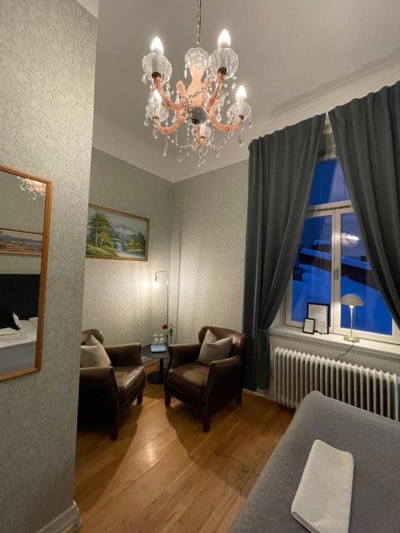 Posezení v ubytování Lilla Hotellet