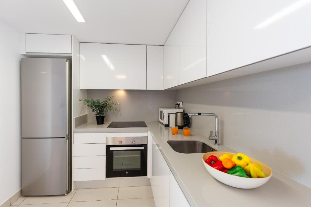 A kitchen or kitchenette at Fidalsa Paradise Sea Punta Prima