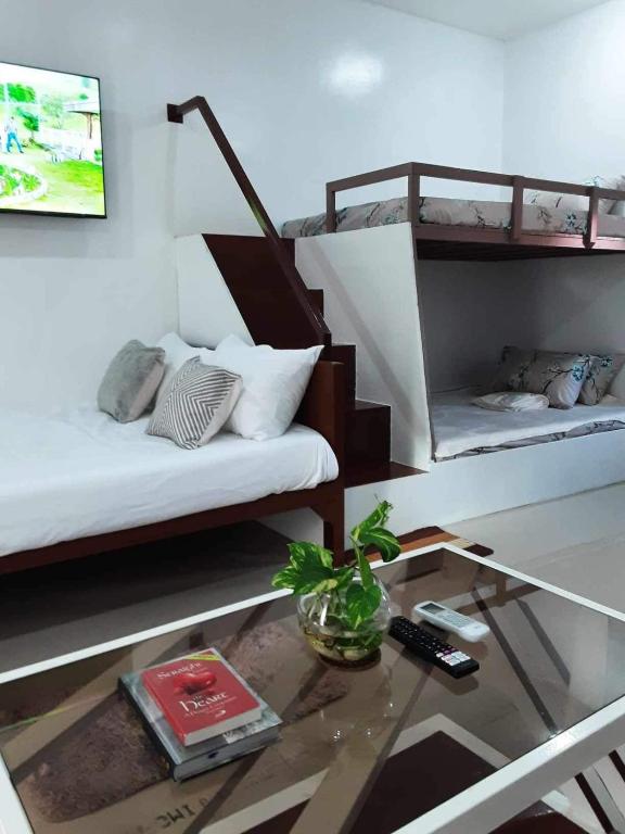 Postel nebo postele na pokoji v ubytování PMPJ Apartment