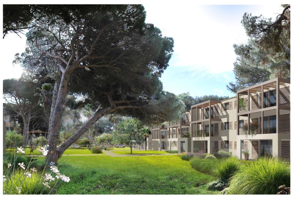 イエールにあるRésidence Prestige Odalys Le Rivieraの木造の複合アパートメントのレンダリング