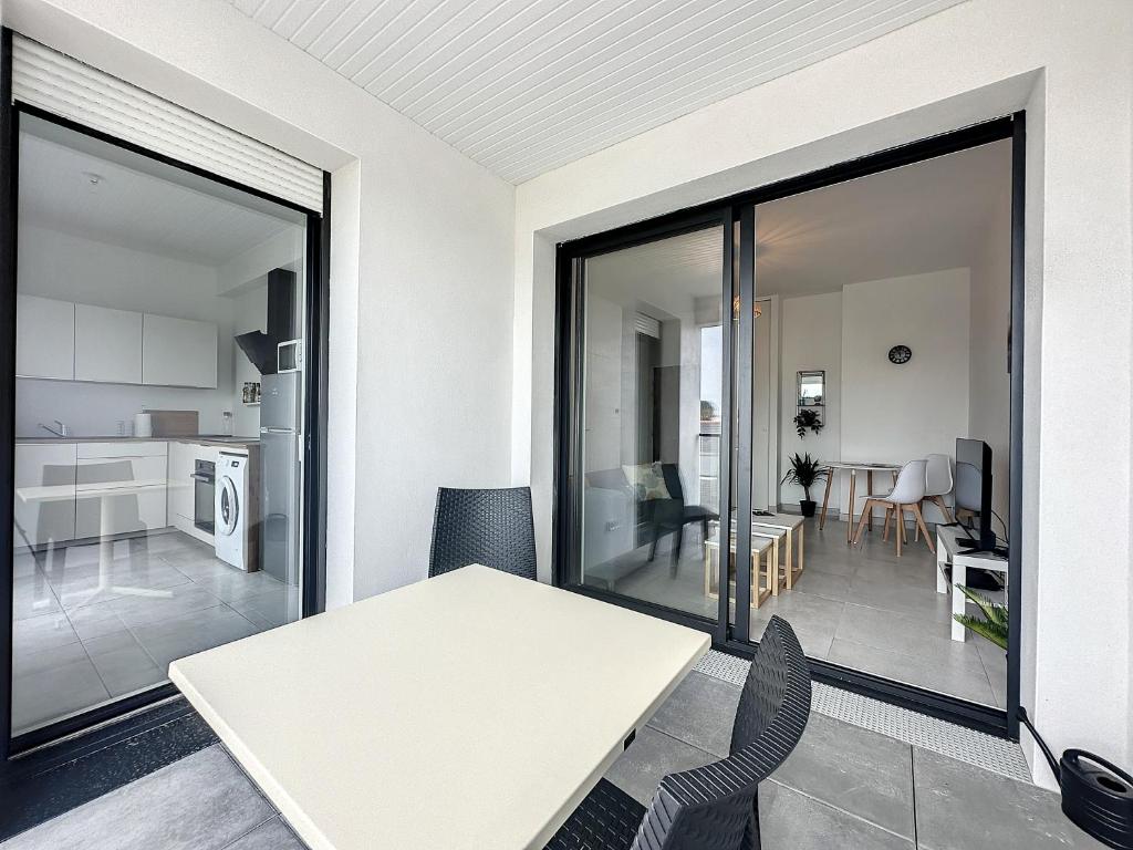 Kuchyň nebo kuchyňský kout v ubytování Le 121 - Appartement 101