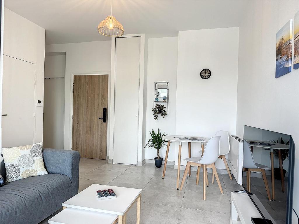 Posezení v ubytování Le 121 - Appartement 101