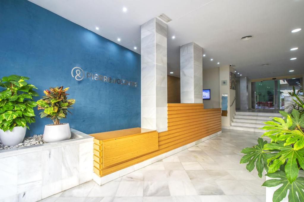 The lobby or reception area at Pierre & Vacances Sevilla