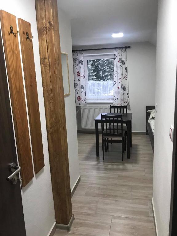 Kuchyň nebo kuchyňský kout v ubytování Apartmány v Chalupě nad Modravou