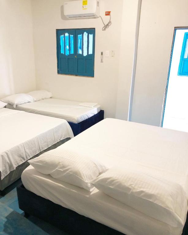 Postel nebo postele na pokoji v ubytování Casa Santorini
