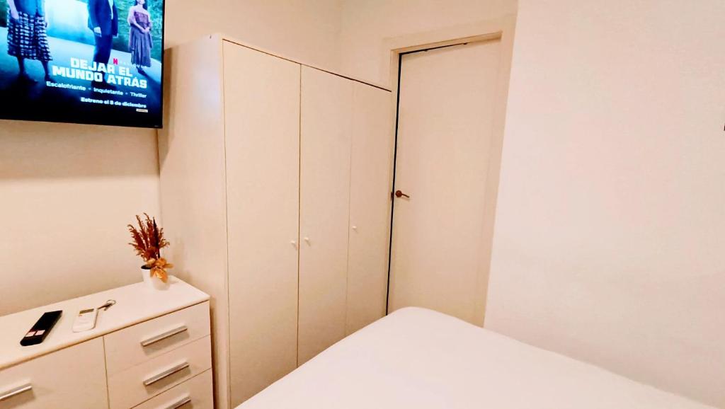 TV a/nebo společenská místnost v ubytování Hostal Estudios