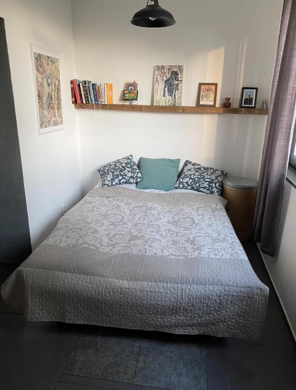 Postel nebo postele na pokoji v ubytování LaČeladná - Tinystudio
