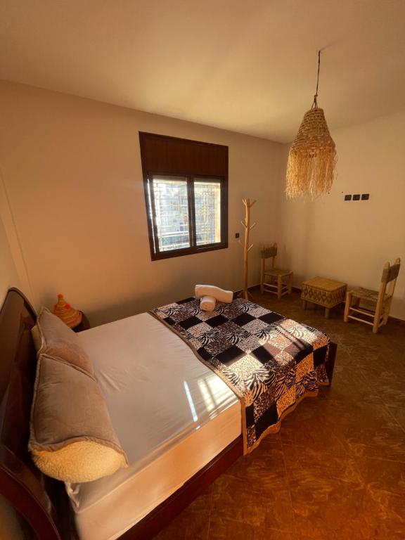 Postel nebo postele na pokoji v ubytování ASNFU AUBERGe