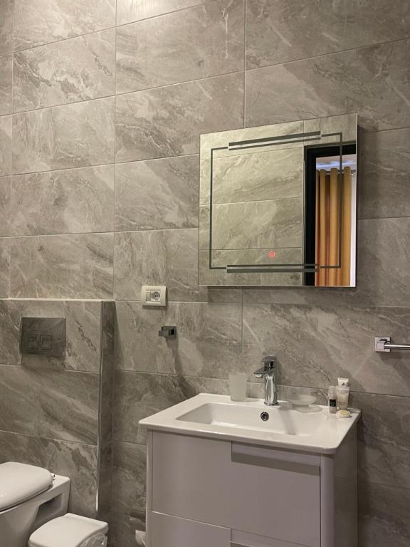 Koupelna v ubytování Ora Apartament