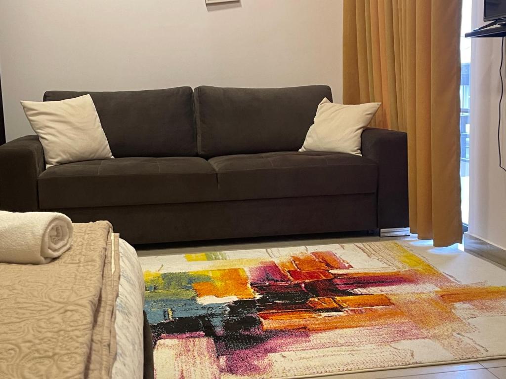 Posezení v ubytování Ora Apartament