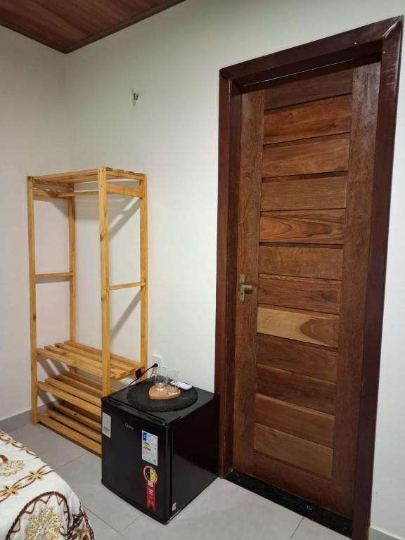 Postel nebo postele na pokoji v ubytování Essência de Atins