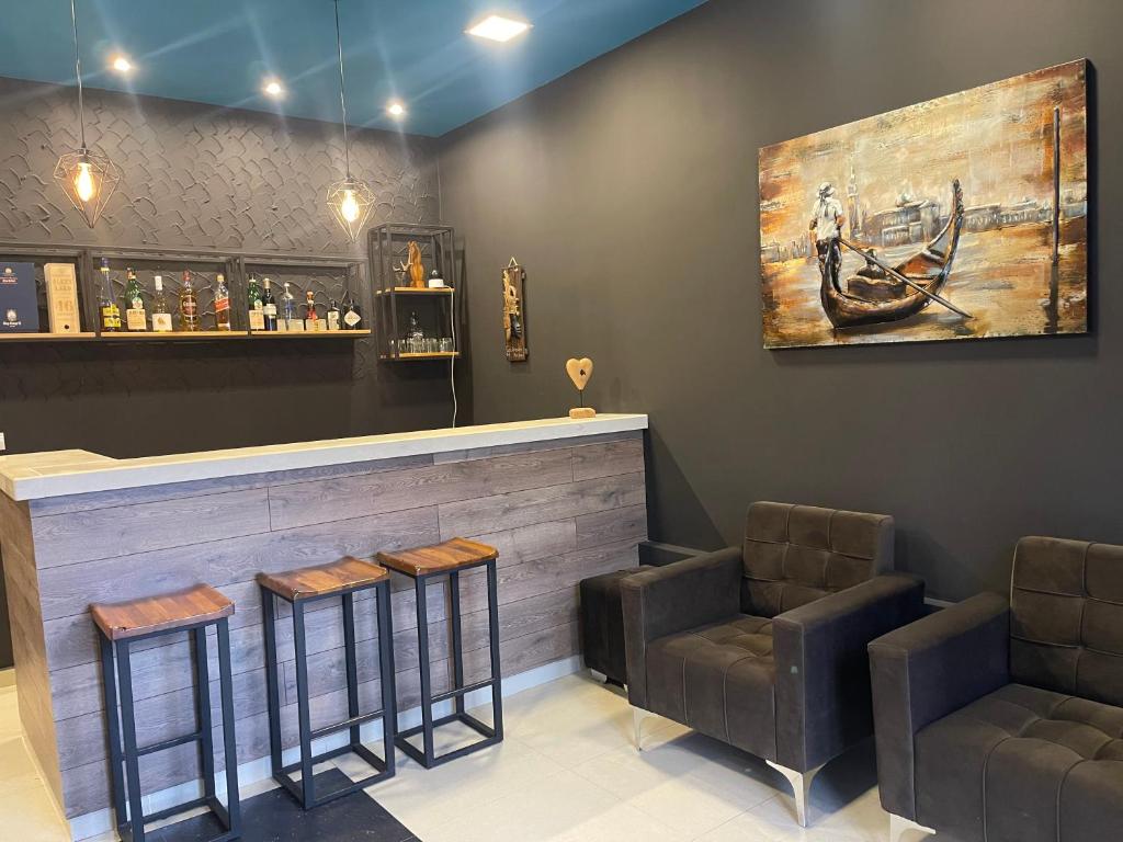 Posezení v ubytování Ora Apartament