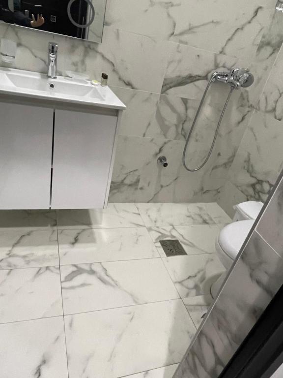 Koupelna v ubytování Ora Apartament