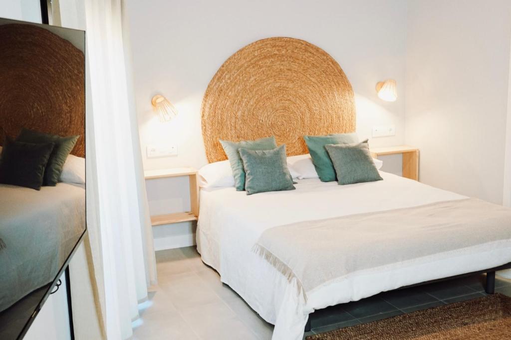 Postel nebo postele na pokoji v ubytování Apartamentos Los Flamencos