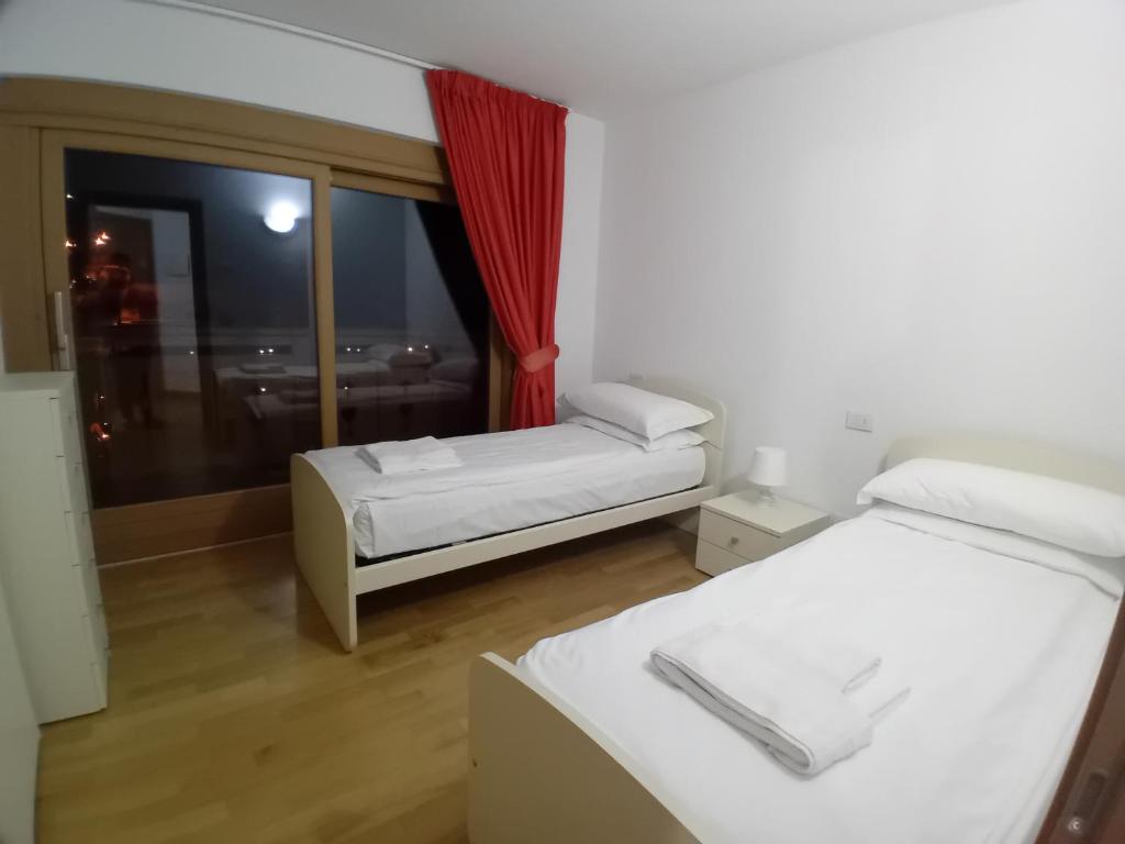 Postel nebo postele na pokoji v ubytování Residence Rose