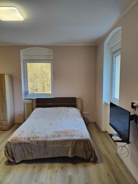 Postel nebo postele na pokoji v ubytování Villa Pirken Hammer
