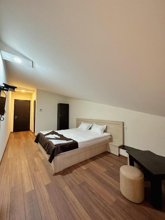 Postel nebo postele na pokoji v ubytování Hotel Imperial