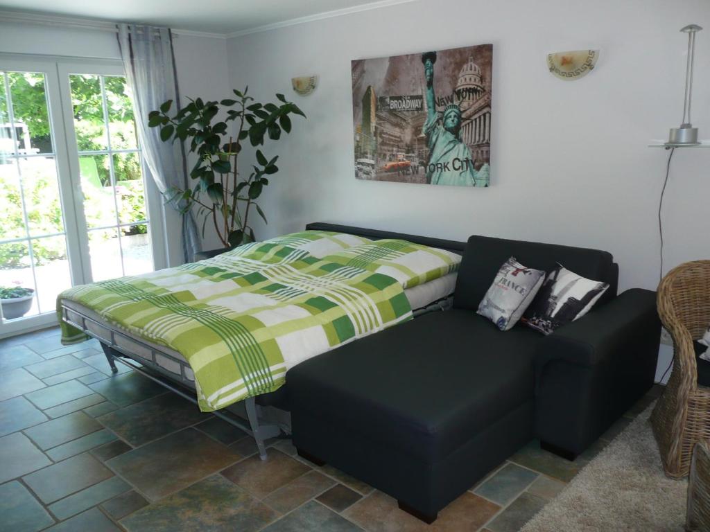 Postel nebo postele na pokoji v ubytování Ferienwohnung "Sweet Home"