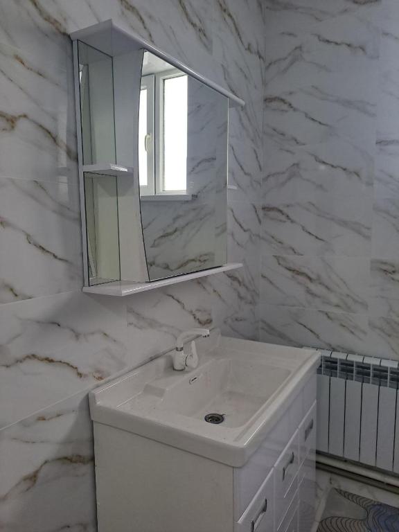 Koupelna v ubytování GuestHouse "ERKIN"