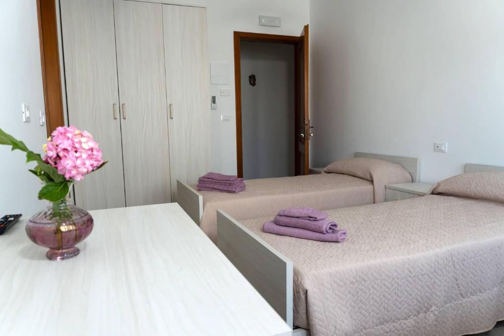 Postel nebo postele na pokoji v ubytování BnB Martin