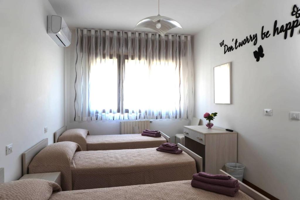 Postel nebo postele na pokoji v ubytování BnB Martin