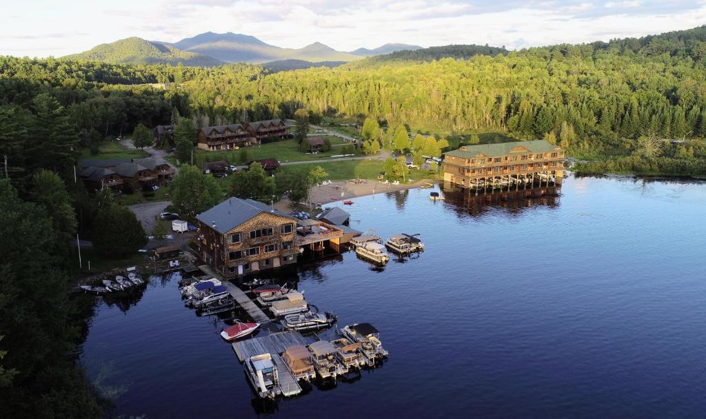 an aerial view of a resort on a lake at Ampersand Bay Resort in Saranac Lake