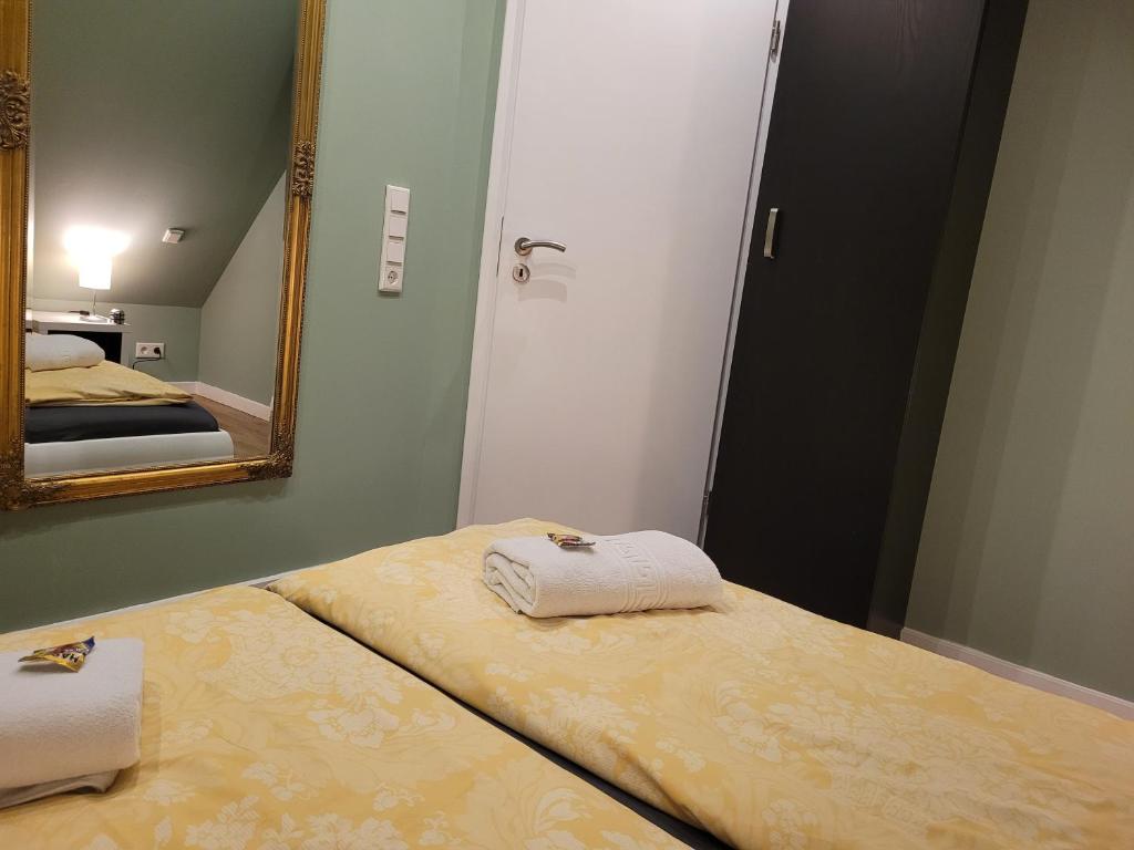 Postel nebo postele na pokoji v ubytování Ferienhaus Wind