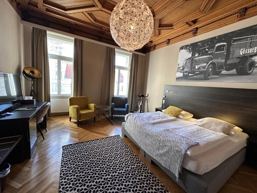 Postel nebo postele na pokoji v ubytování Hotel Brauhof Wien