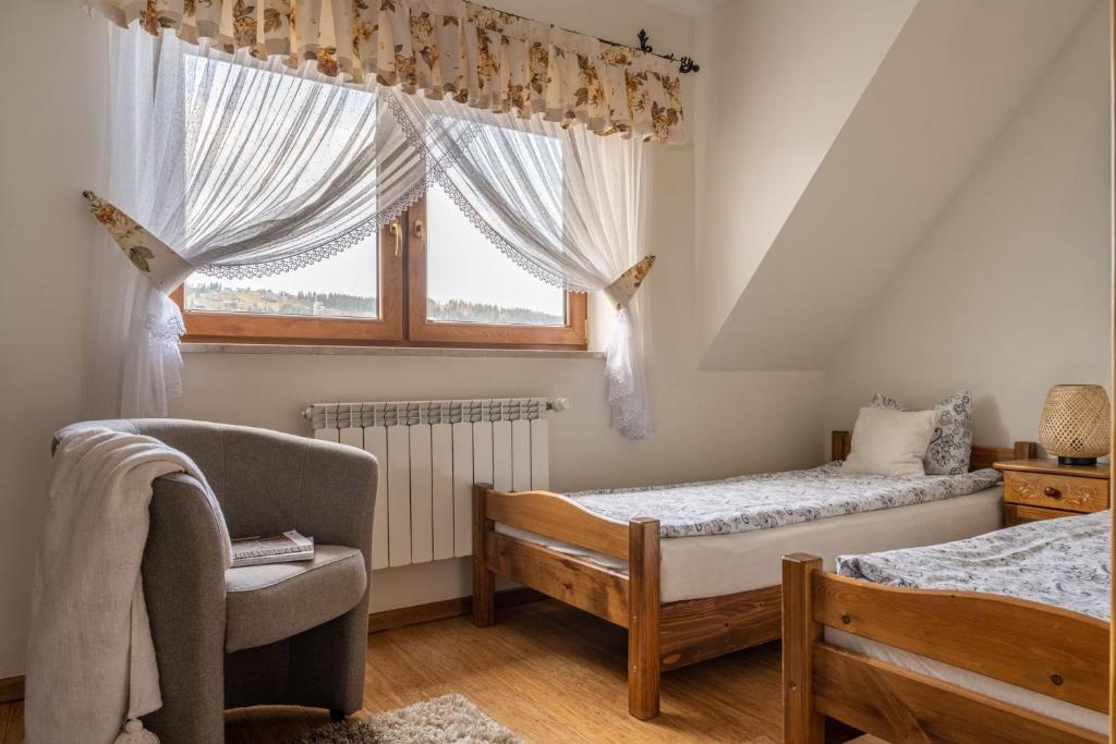 Posteľ alebo postele v izbe v ubytovaní Lux-Apart Zakopane