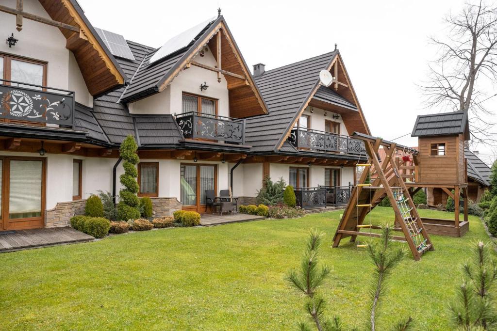 Vonkajšia záhrada v ubytovaní Lux-Apart Zakopane